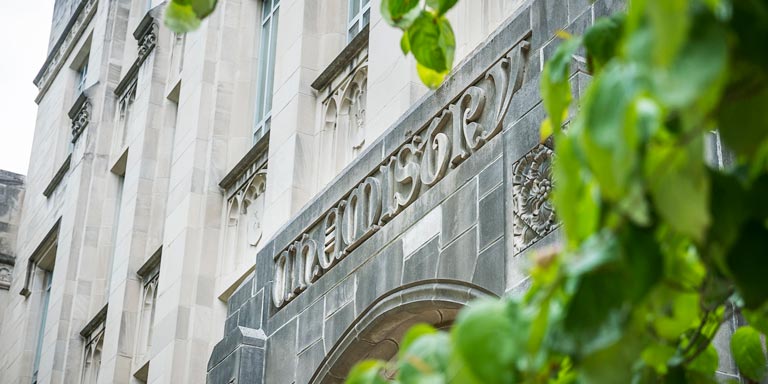 Limestone carving of Chemistry building sign.